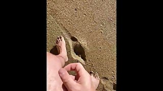 Talking to you as I stroke my cock at a nude beach