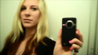 Sensual blonde milf makes herself cum in the dressing room