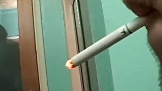 Bottom gay smokes cigars while analed