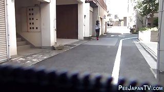 Bizarre asian piss street