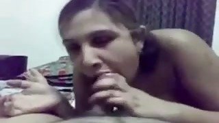 Brunette Indian lady with big boobies was sucking her man's dick