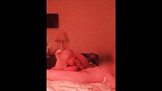 Busty blonde sucking cock