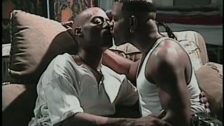 Two black gays share hot kisses and have hardcore anal sex on the couch