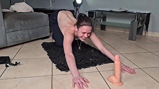 skinny slut doing pushups while gagging on a dildo topless