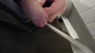 Uncut dick pissing in public toilet