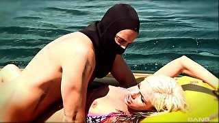 Hardcore fucking on the raft between a masked guy and a sexy blonde