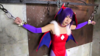 Pretty Asian babe in a sexy costume gets schooled in bondage