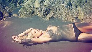 Beautiful Kristen Nicole shows her hot body on a beach