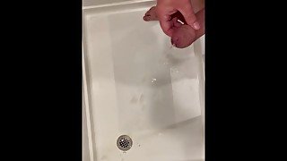 Cumming hard in hotel shower, pissing