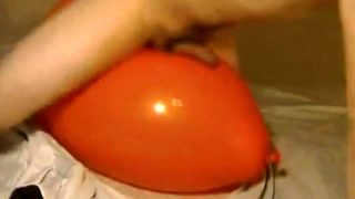 Big inflatable orange balloon humping cum