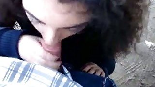 Curly-haired girlfriend sucks my rigid cock like a seasoned pro