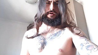 sexy long haired man masturbating until cumming