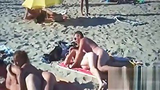 Swingers Having Fun Outdoors At A Beach