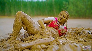 Orgasm in lake of mud