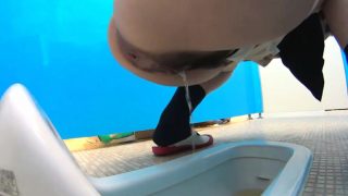 Peeing asian babes filmed