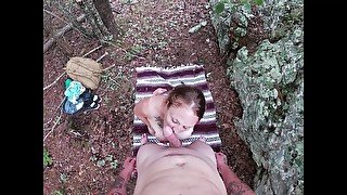 Redhead with big boobs sucks dick and swallows load in the woods