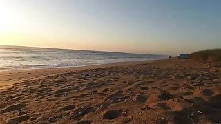 Masturbating on beach while being watched