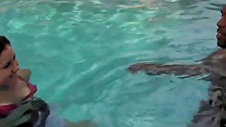 Black homo enjoys a blowjob from female hottie in the pool