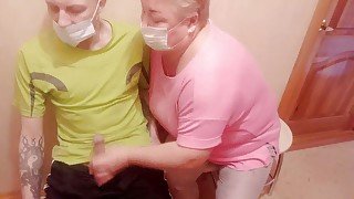 A woman jerks off my cock in the waiting room