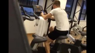 SEXY GYM TRAINER DOING CARDIO