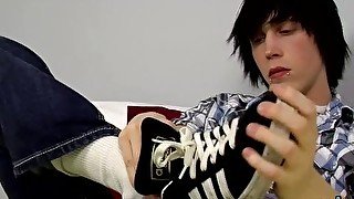 Young emo Tyler Bolt jacks off his cock and licks his toes