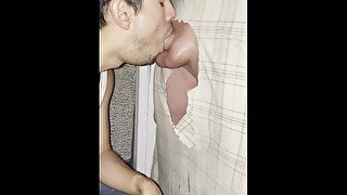 latino sucking DL cock through gloryhole