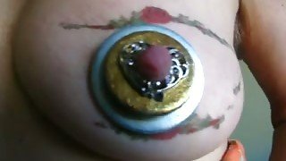 Tattooed breast of my wife looks like an eye with that jewelry