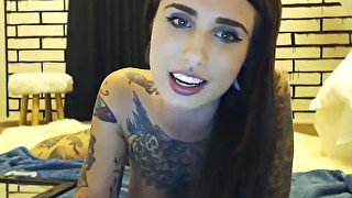 This horny fine ass tattooed webcam honey loves riding her suction cup dildo