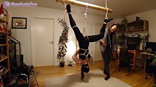 Shibari play session with suspension in butterfly harness and spanking