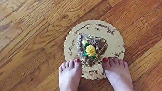 Cute feet in birthday cake