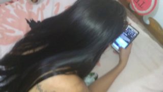 fingering and fisting the brunette teen while she is playing on her phone