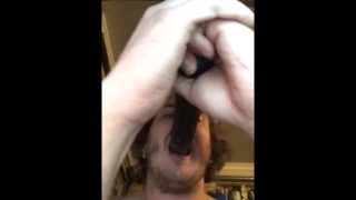 Guy practicing dildo blowjob 