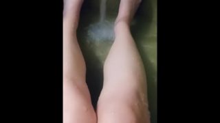 Rubbing Legs in the Bath