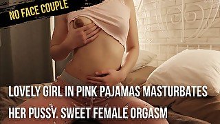 Lovely girl in pink pajamas masturbates her pussy. Sweet female orgasm