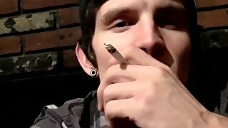 Tattooed twink Lex smokes and tugs solo