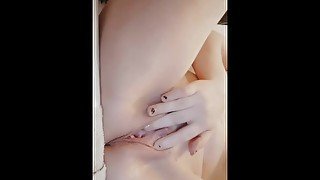 Naughty slut fingers herself after bath with friend in the next room