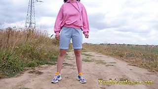 Hipster redhead changes wet clothes and pee outdoor - Girl with a hoodie pee trough her jeans