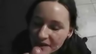 Horny brunette licks hard cock at home