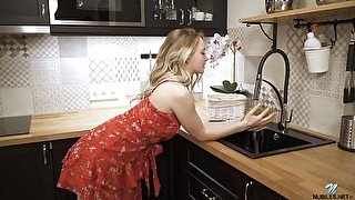 Cutest blond housewife Sophie is masturbating pussy on the table