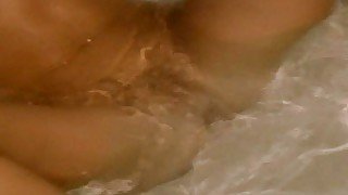 Small tits teen fingering her pussy on the beach