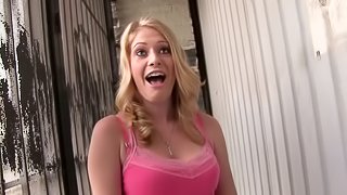 Beautiful blondie is finally persuaded to show her boobies