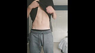 Smooth twink strips out of grey sweatpants