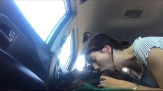 Pretty amateur brunette sucks a big black shaft in the car