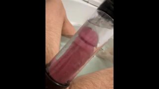 Playing with my penis pump in the bath