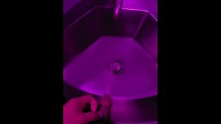 Pissing in the bar sink