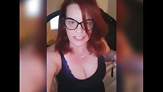 Red Head milf in sexy glasses in Black bodysuit shows off curvy body