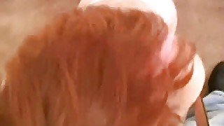 Redhead teen is sucking big and hard dong