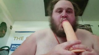 Deepthroating a massive cock