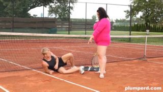 Obese woman facesits on her trainer at the tennis court