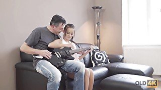 Petite 18-year-old Tina Walker pays for guitar lesson with her tight pussy in HD porn